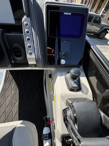 Slide: The Image of Control panel of 2025 Barletta Boats Lusso L25MAT with Simrad display and joystick. - 16