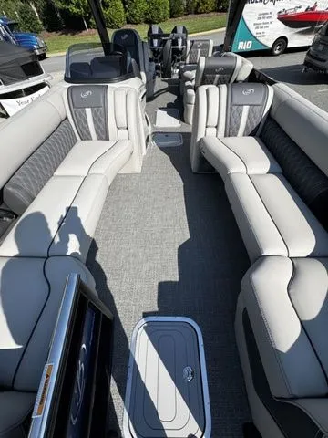 Slide: The Image of 2025 Barletta Lusso L25MAT boat interior with luxurious seating and modern design. - 6