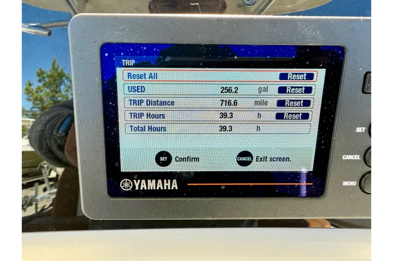 Slide: The Image of Yamaha display showing trip data: 256.2 gallons used, 716.6 miles, 39.3 hours. Pioneer 222 Islander 2024. - 9