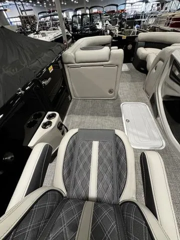 Slide: The Image of 2025 Barletta Boats R23UCA interior with luxurious seating and modern design. - 13