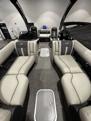 Slide: The Image of Luxurious 2025 Barletta Boats R23UCA interior with plush seating and modern design. - 4