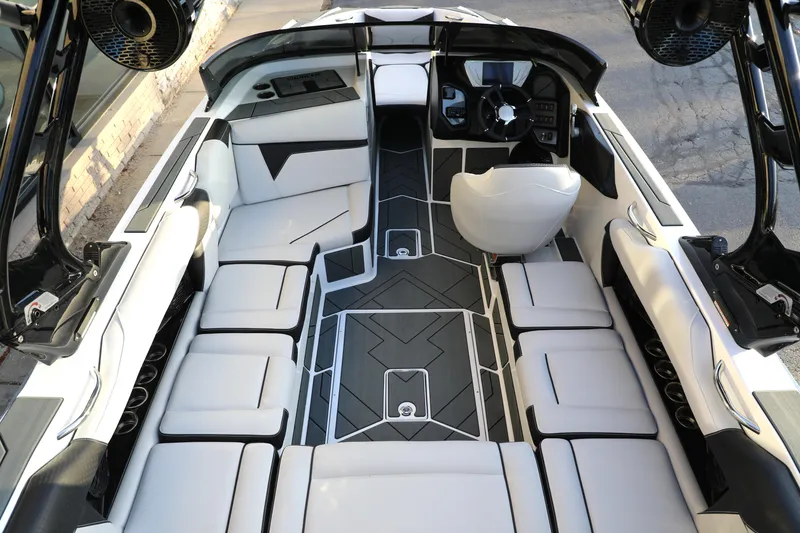 Slide: The Image of 2026 Supreme S220 boat interior with sleek seating and modern dashboard design. - 1