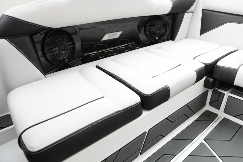 Slide: The Image of Luxurious interior seating of 2026 Supreme S220 boat with speakers and cup holders. - 10