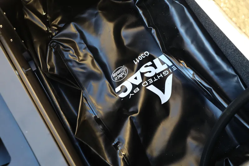 Slide: The Image of Black bag with "EIGHTED BY ATSAC" logo inside Supreme S220, 2026 model. - 16