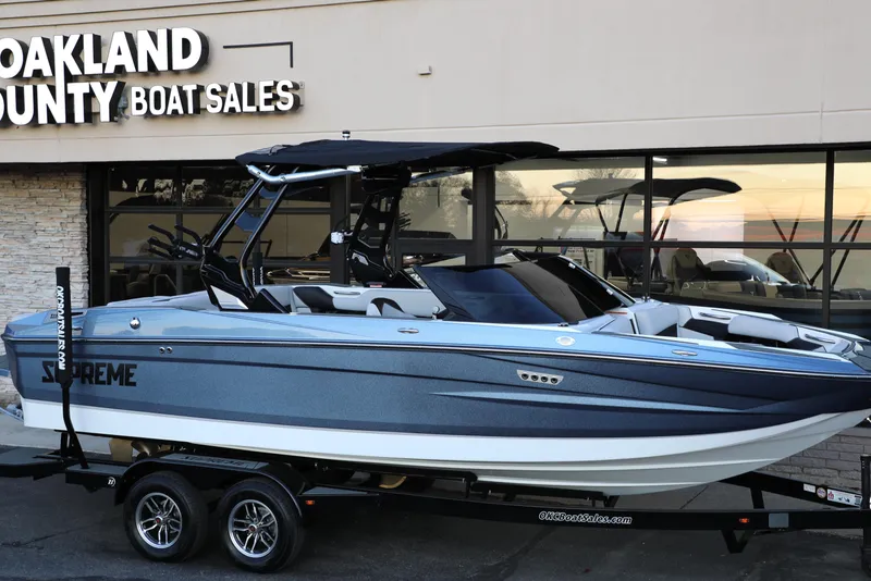 Slide: The Image of 2026 Supreme S220 boat displayed at Oakland County Boat Sales. - 35