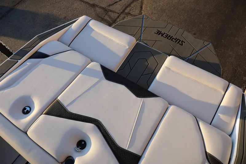 Slide: The Image of 2026 Supreme S220 boat interior with sleek, modern upholstery and stylish design. - 6