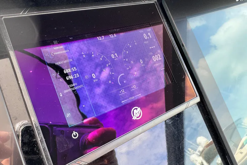 Slide: The Image of Dashboard of 2021 Monterey 378 Super Express displaying engine hours and maintenance data. - 22