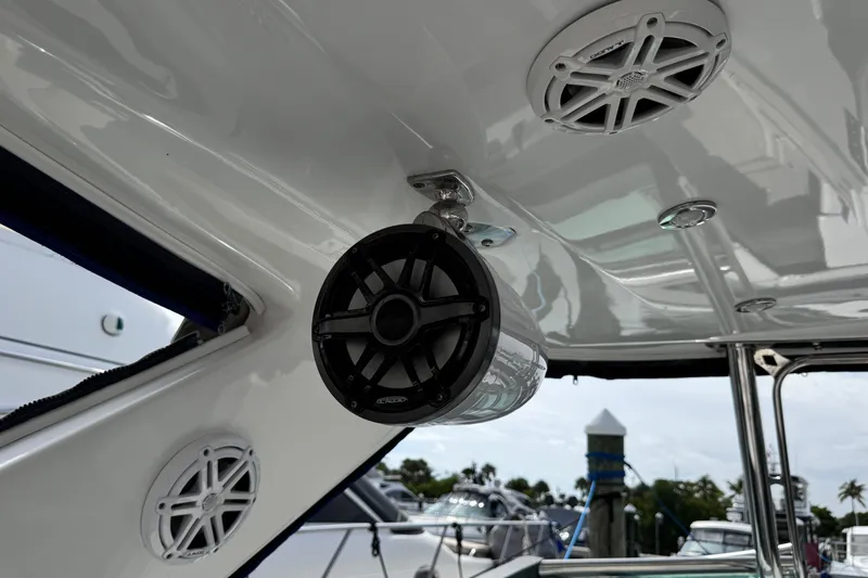 Slide: The Image of 2021 Monterey 378 Super Express boat with mounted speakers and sleek interior design. - 28