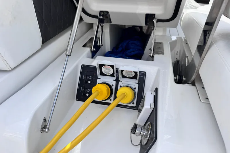 Slide: The Image of 2021 Monterey 378 Super Express boat electrical panel with yellow power cables. - 33
