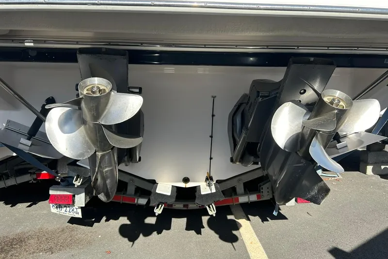 Slide: The Image of 2004 Regal Commodore 2860 boat propellers and stern view. - 10