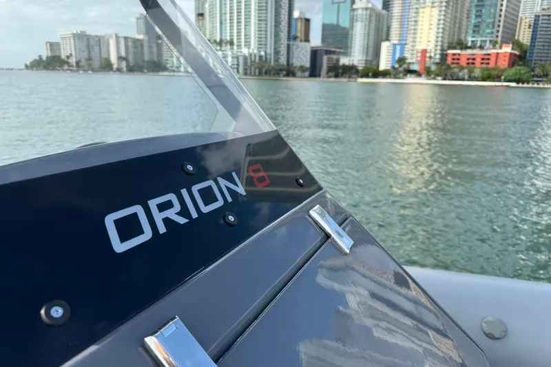 Slide: The Image of 2026 Northstar Orion 8 boat on water with city skyline in background. - 17