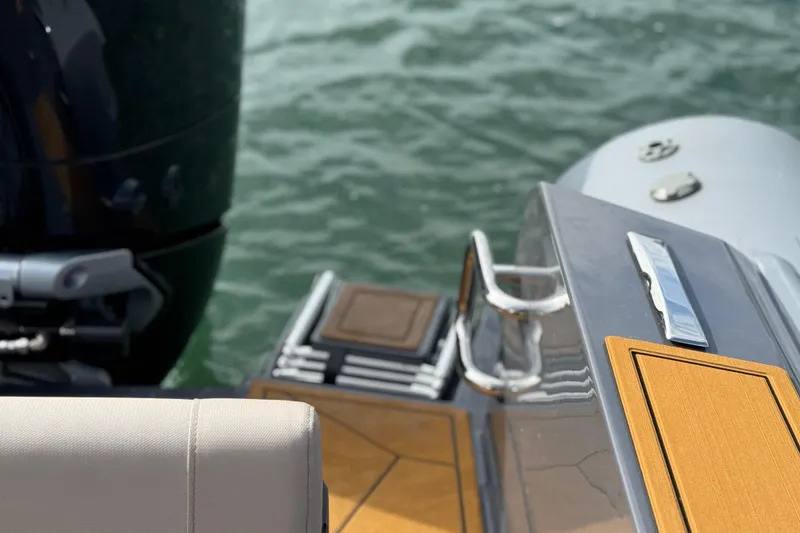 Slide: The Image of Sleek Northstar Orion 8 boat deck, 2026 model, with water in the background. - 29