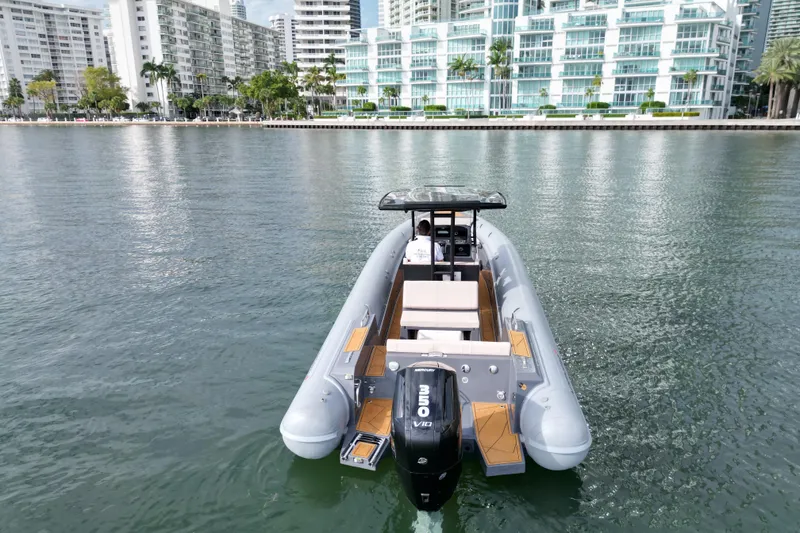 Slide: The Image of 2026 Northstar Orion 8 boat on water, cityscape background, modern design. - 9
