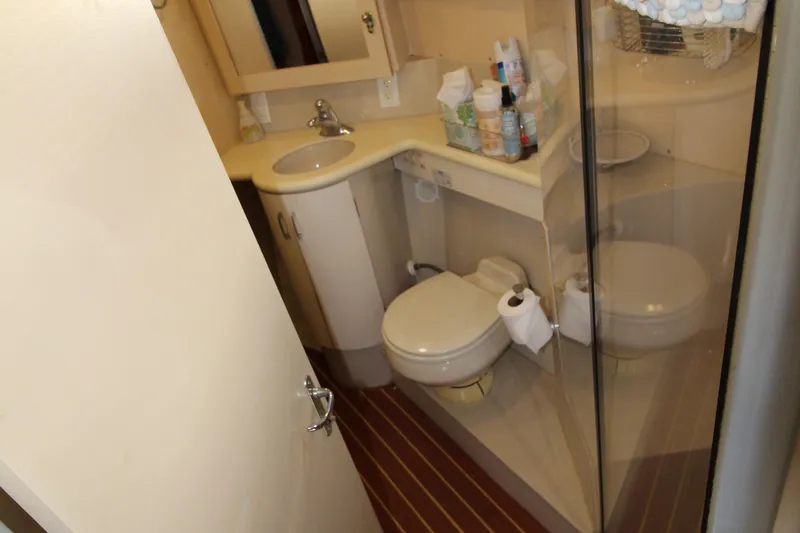 Slide: The Image of Bathroom interior of 1990 Carver 3467 Santego yacht with toilet and sink. - 31