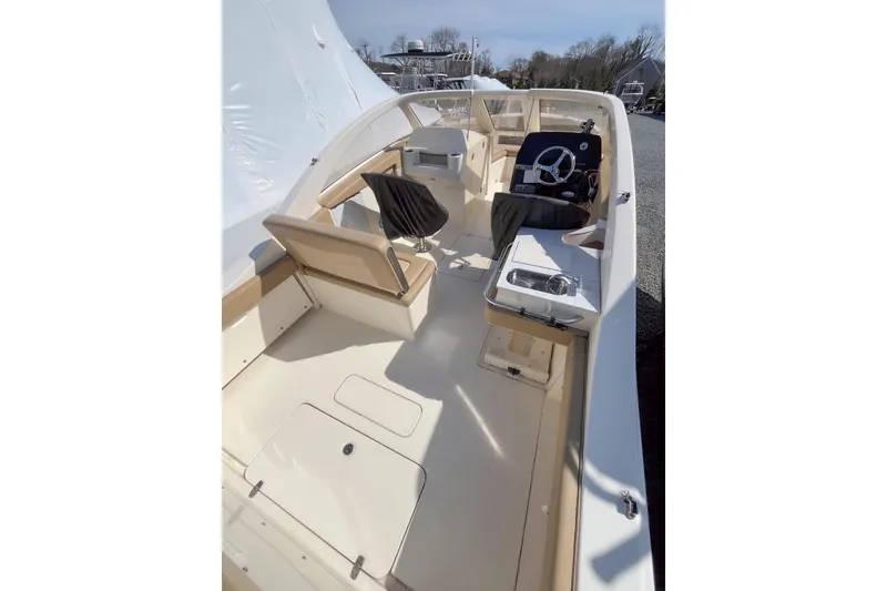 Slide: The Image of Interior view of a 2021 Scout 240 Dorado boat with helm station. - 8