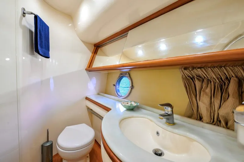 Slide: The Image of Luxurious bathroom interior of 2010 Azimut 62 Evolution yacht with modern fixtures. - 11