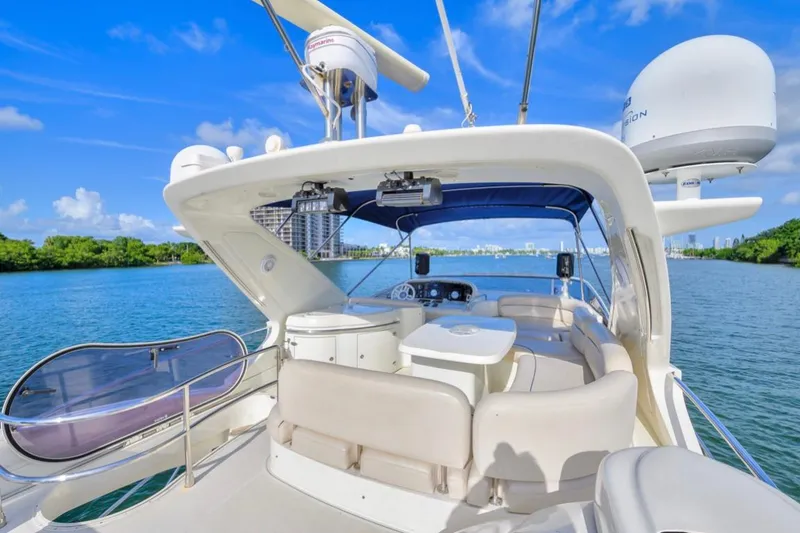 Slide: The Image of Luxurious 2010 Azimut 62 Evolution yacht interior with scenic water view. - 15