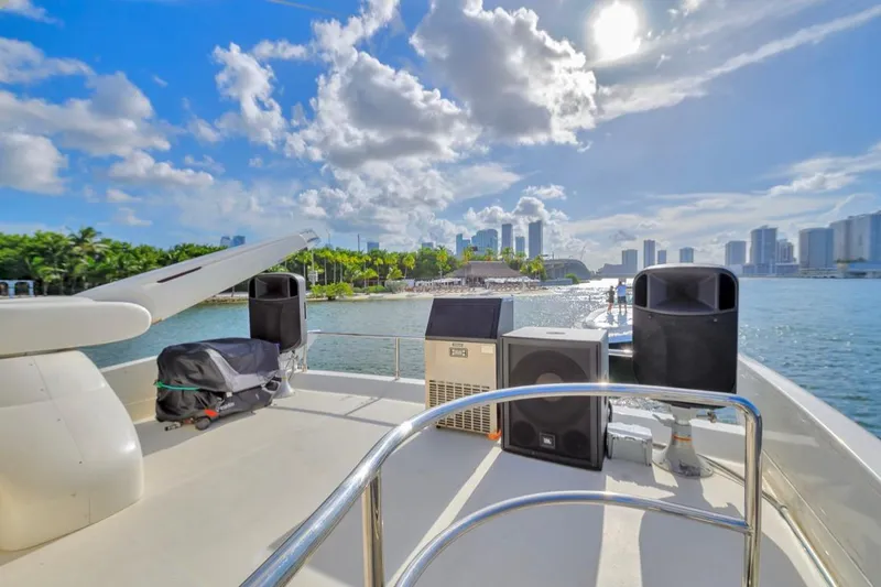 Slide: The Image of Azimut 62 Evolution yacht deck with city skyline and waterfront view, 2010 model. - 17