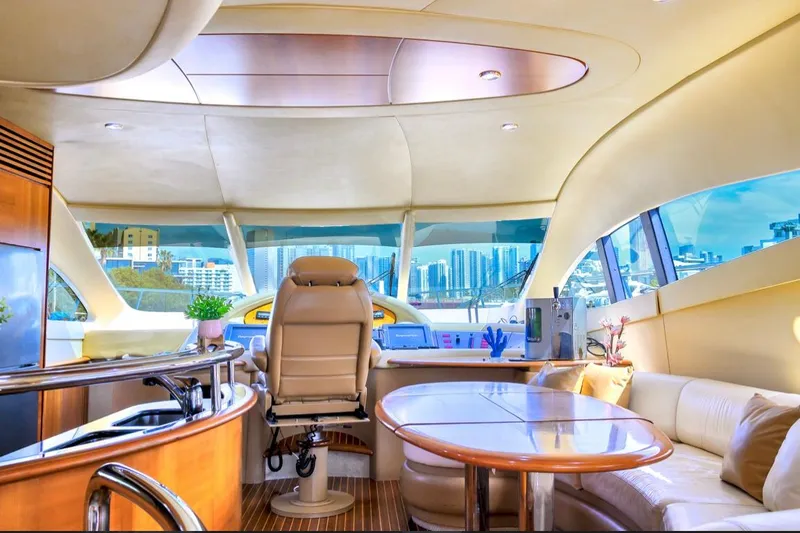Slide: The Image of Luxurious interior of 2010 Azimut 62 Evolution yacht with modern helm and seating area. - 6