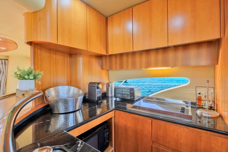 Slide: The Image of Luxurious kitchen interior of 2010 Azimut 62 Evolution yacht with ocean view. - 7