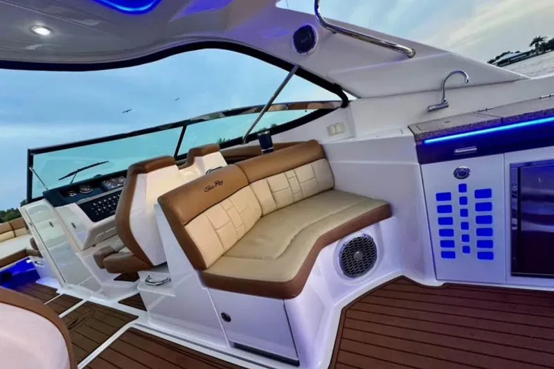 Slide: The Image of Luxurious interior of 2015 Sea Ray 350 SLX boat with plush seating and modern amenities. - 17