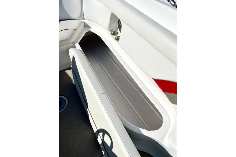 Slide: The Image of 2013 Hurricane SunDeck Sport 220 OB boat interior storage compartment. - 29