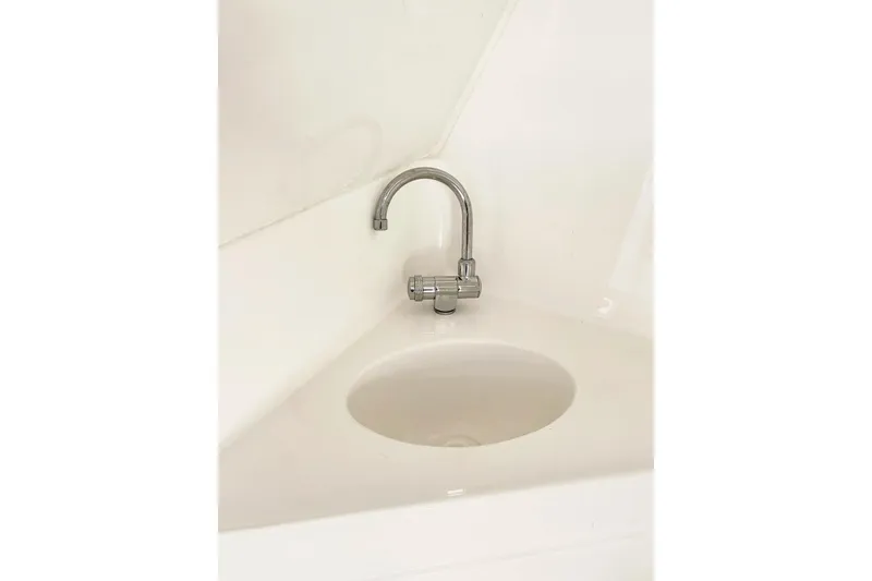 Slide: The Image of Stainless steel faucet and sink on 2013 Hurricane SunDeck Sport 220 OB boat. - 37