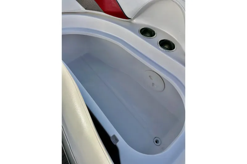 Slide: The Image of Interior view of 2013 Hurricane SunDeck Sport 220 OB boat storage compartment. - 48