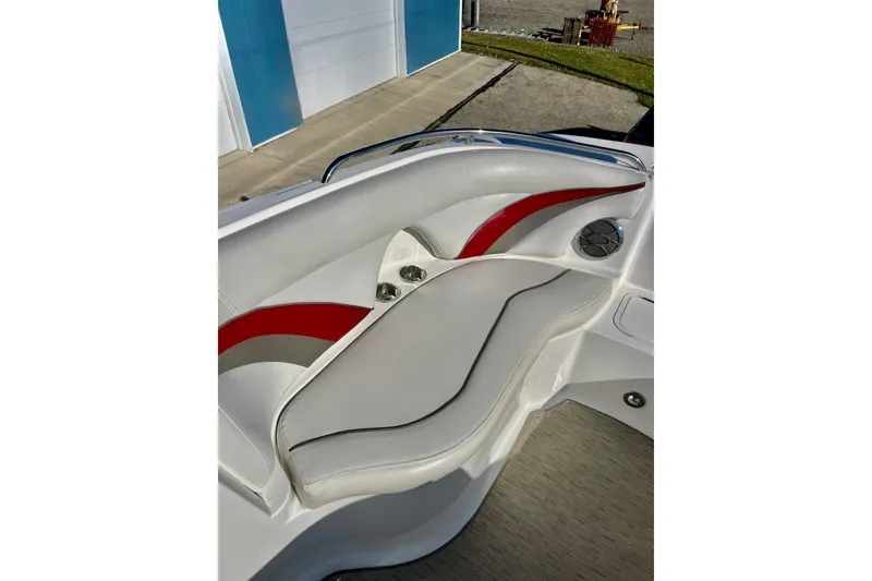Slide: The Image of 2013 Hurricane SunDeck Sport 220 OB boat interior with white and red seating. - 49