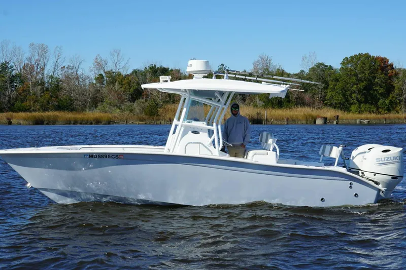 The Image of 2018 Cape Horn 24 XS boat on water with Suzuki engine, scenic background. - 0