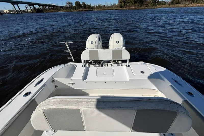 Slide: The Image of 2018 Cape Horn 24 XS boat with dual engines on a calm river. - 24