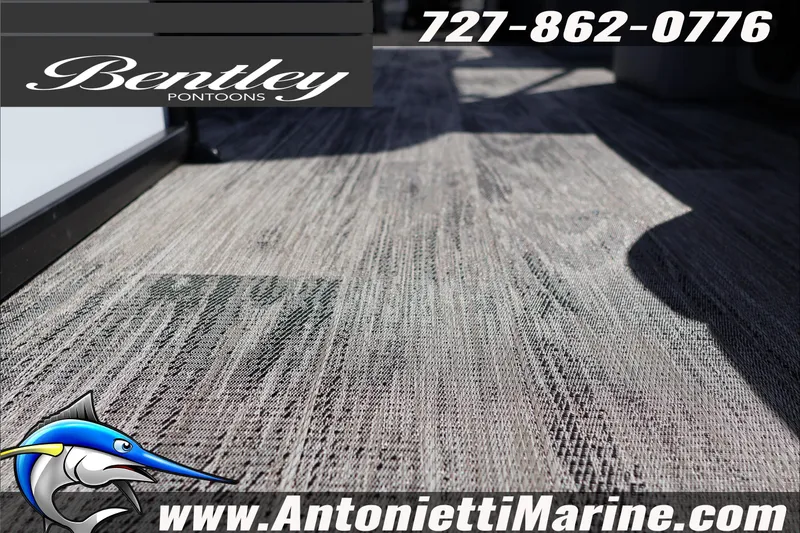 Slide: The Image of Bentley Pontoons Bolt 223, 2026 model, showcased with flooring detail and contact information. - 19