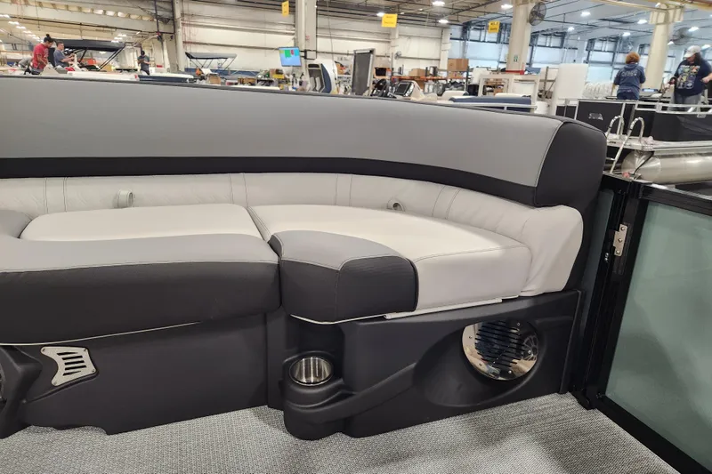 Slide: The Image of 2026 Avalon LSZ Cruise Rear Bench in a showroom, featuring sleek gray upholstery. - 15
