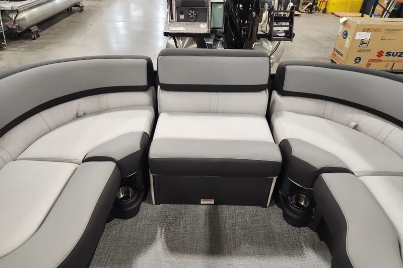 Slide: The Image of 2026 Avalon LSZ Cruise Rear Bench with gray and black seating in a boat interior. - 20