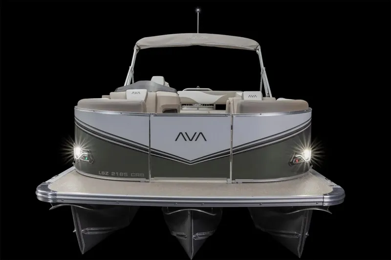 Slide: The Image of 2026 Avalon LSZ Cruise Rear Bench with foldable table in a showroom setting. - 8