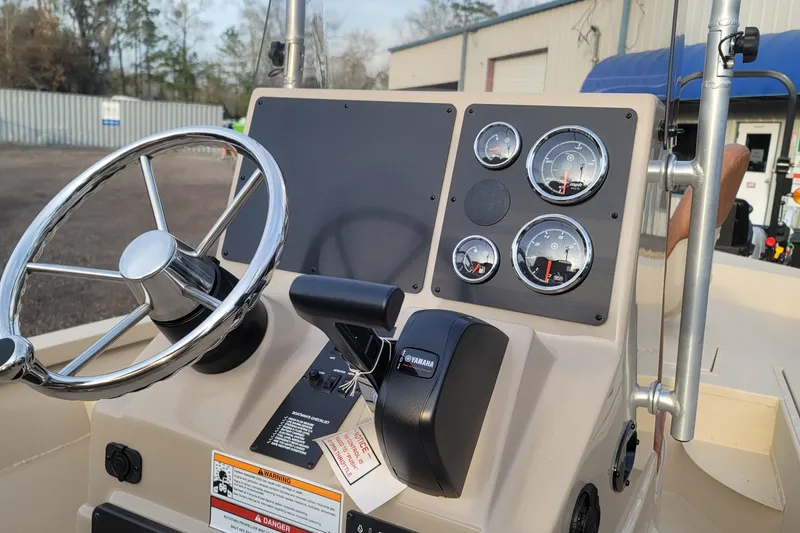 Slide: The Image of Steering console of 2026 G3 Bay 19 GX boat with Yamaha controls and gauges. - 12