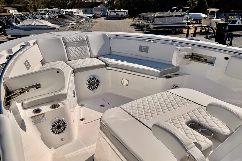 Slide: The Image of Luxurious seating area on 2026 Sea Fox 328 Commander boat, featuring elegant white upholstery. - 10