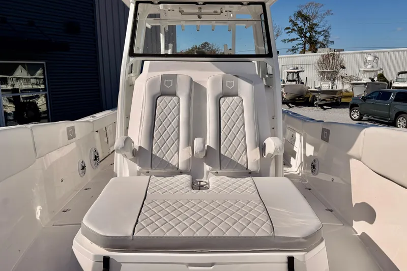 Slide: The Image of 2026 Sea Fox 328 Commander boat interior with luxurious seating and modern design. - 12