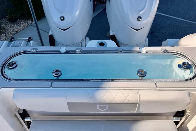 Slide: The Image of 2026 Sea Fox 328 Commander boat with dual engines and sleek seating. - 18