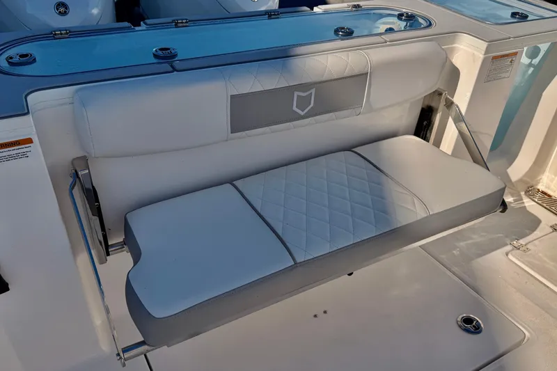 Slide: The Image of 2026 Sea Fox 328 Commander boat seat with quilted design and foldable mechanism. - 19
