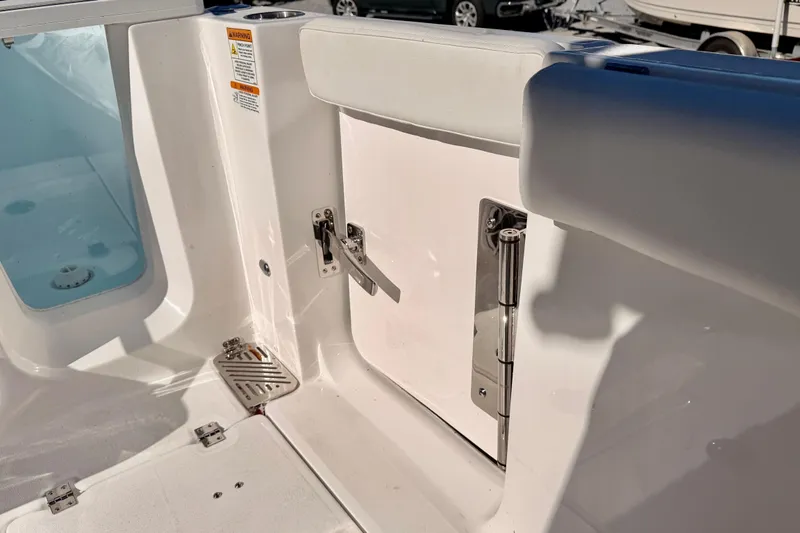 Slide: The Image of 2026 Sea Fox 328 Commander boat interior with white seating and stainless steel hardware. - 22