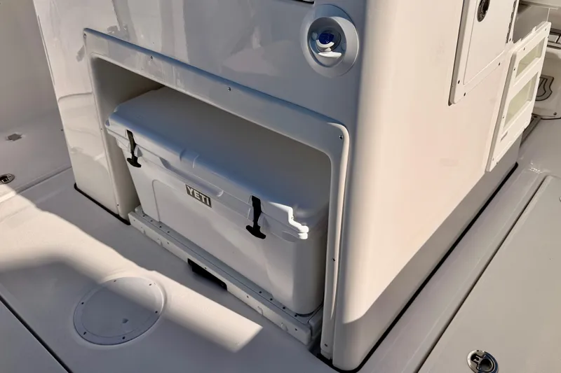 Slide: The Image of 2026 Sea Fox 328 Commander with Yeti cooler storage compartment. - 27