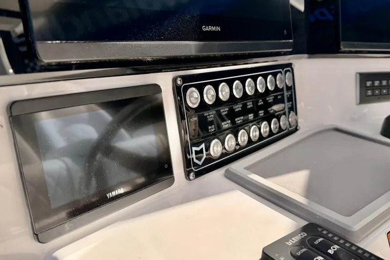 Slide: The Image of Control panel of 2026 Sea Fox 328 Commander boat with Yamaha and Garmin displays. - 33