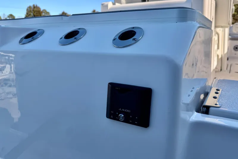 Slide: The Image of 2026 Sea Fox 328 Commander boat console with JL Audio system and rod holders. - 37