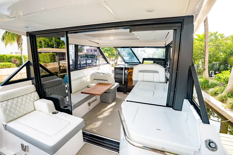 Slide: The Image of Luxurious cabin interior of 2022 Regal 36 XO yacht with cozy bedding. - 41