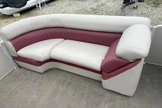 Slide: The Image of 2013 Premier 220 SunSation boat seating with white and maroon upholstery. - 5