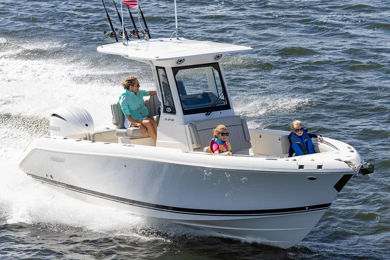 The Image of Manufacturer Provided Image: 2025 Pursuit S 248 Sport boat cruising on water with passengers enjoying the ride. - 0
