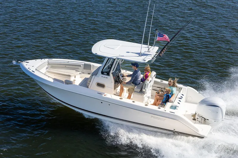 Slide: The Image of Manufacturer Provided Image: 2025 Pursuit S 248 Sport boat cruising on open water with passengers. - 2