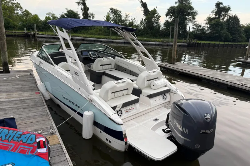 The Image of 2023 Regal LX4 boat docked with Yamaha 250 outboard motor. - 0