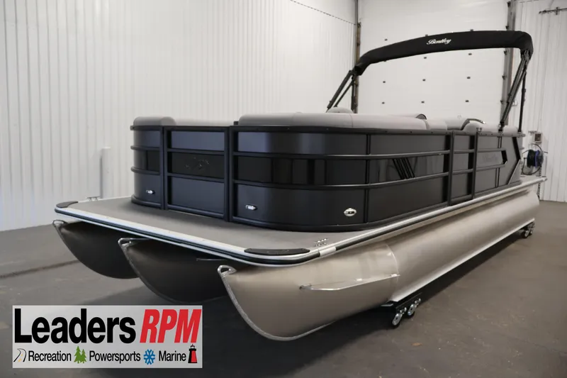 The Image of 2026 Bentley Pontoons 223 Bolt Tri-Toon in showroom, featuring sleek design and modern amenities. - 0